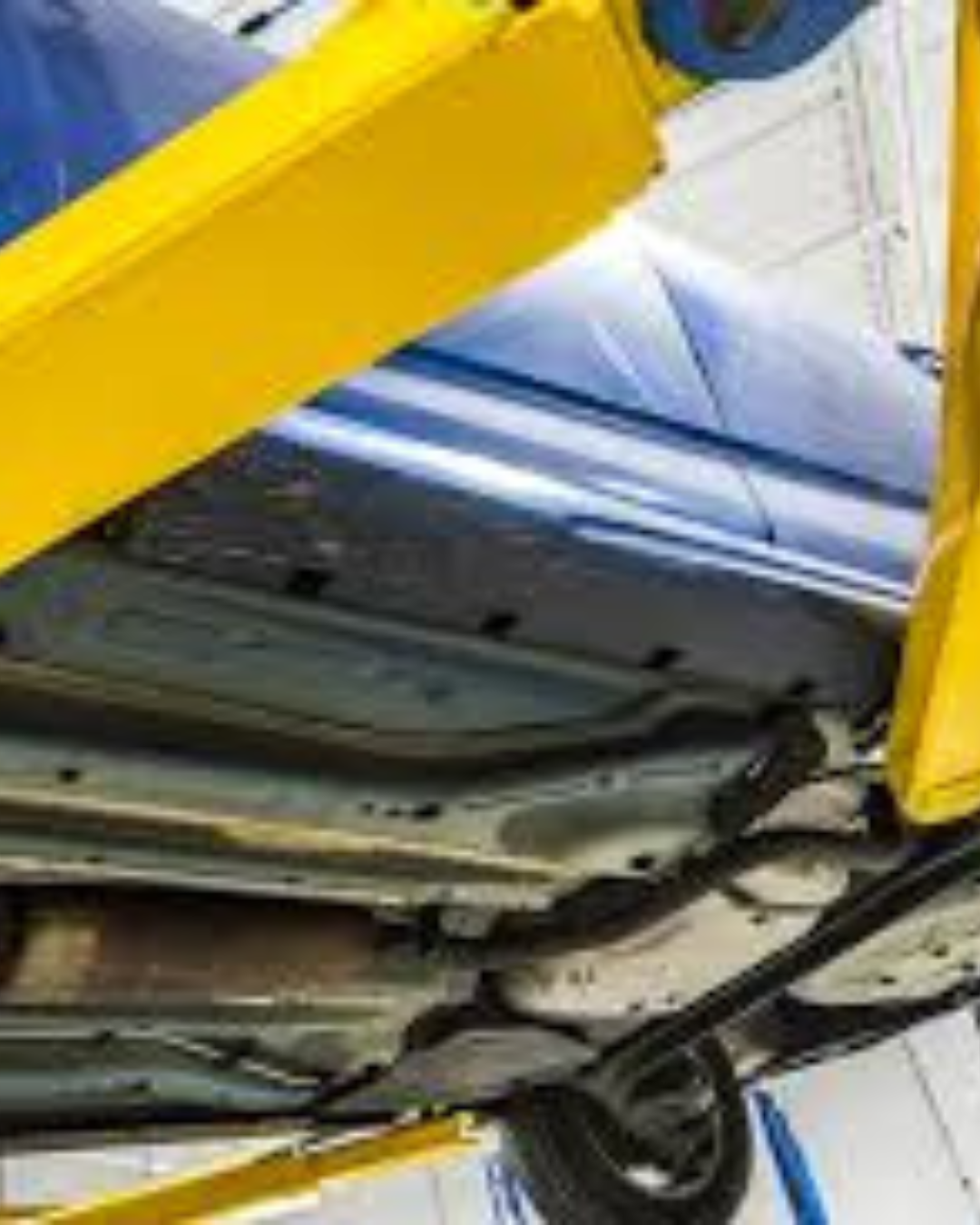 Technician inspecting frame alignment